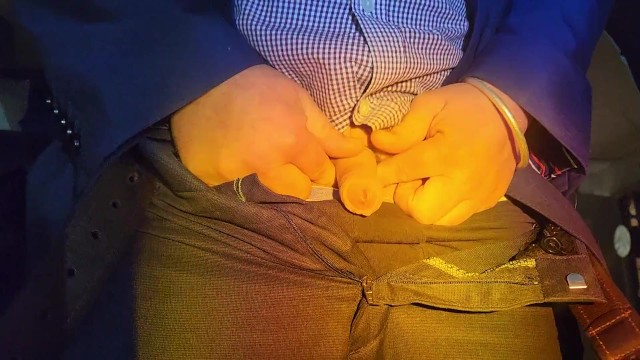 Pissing in the bucket in suit