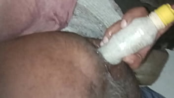 Stuffing my ass with a homemade toy 2