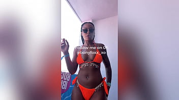 LEAKED: Sexy model Ebony Foxx sensually a cigarette in a bikini