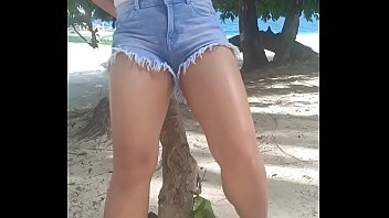 Horny asian girl peeing her pants on tropical island!
