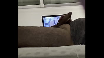 Giving pleasure to my uncut cock on my bed