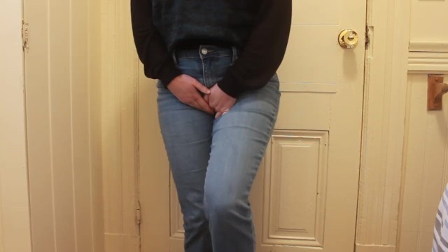 Desperate piss in jeans while waiting for the bathroom
