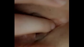 Horny girl fingers herself till she squirts