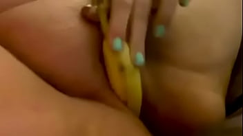 Chubby wife fucks herself with long banana and cums