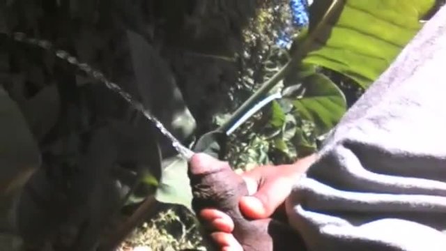 FREAKY EBONY PISSING IN PUBLIC