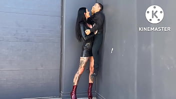 Tall woman in heels lifts a short guy