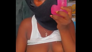 Masked Julie insert dildo in mouth
