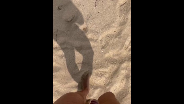 Pee pee in the sand on the beach