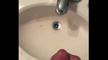 Slow Mo cumshot in a guest sink