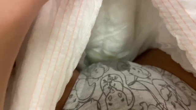 Peeing in panties inside a diaper
