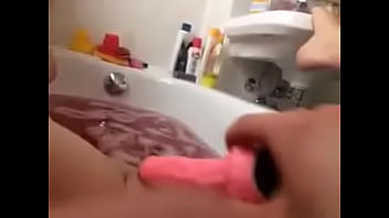 My girlfriend does it with a dildo in the bathtub