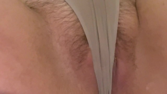 Puffy pink pussy has a full bladder and soaks through panties