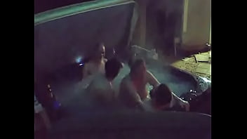 Couples in hot tub