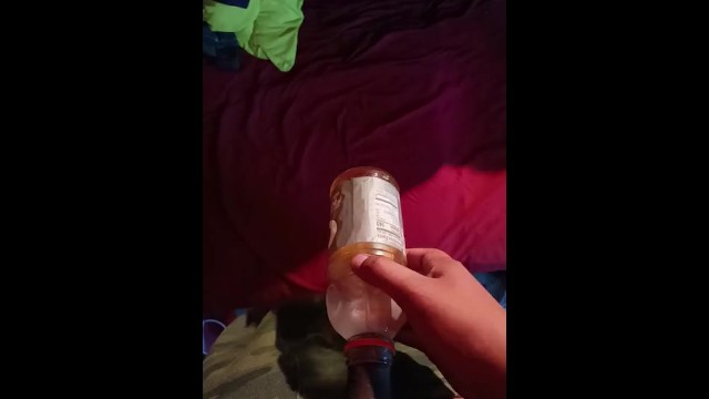 Peeing in a Gatorade bottle 