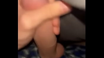 Stroking my cock under the covers
